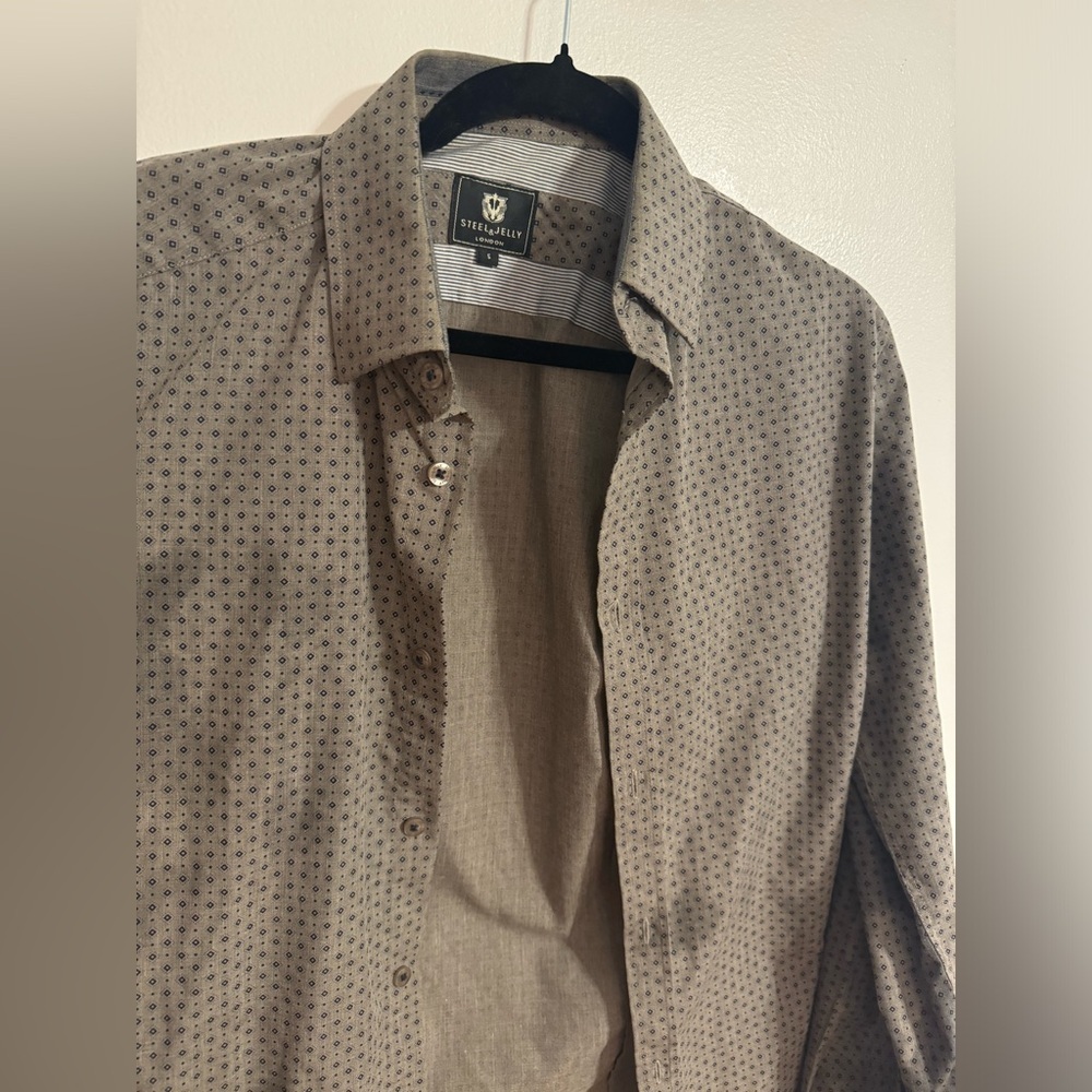 The Elegant Duo: Steel and Jelly from London, Adorned in a Grey and White Shirt